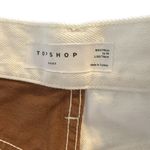 Topshop  paneled straight Kort jeans in brown and white
Women’s Size 9 Photo 9