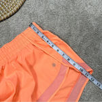 Athleta Mesh Racer Run Mid Rise 4” Shorts Pull On Running in Orange Size XXS Photo 11