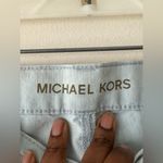 Michael Kors  Light Wash Blue Flared Jeans Raw Hem Boot Cut Size 2 Photo 2