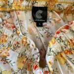 The Comfy And Ready Fiona Floral Mini Skirt in Yellow Photo 6