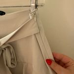 ZARA  tan mini skirt with bow size M Photo 3