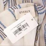 Everly  NWT medium cream ruffle bow detail romper Photo 2