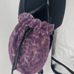 Purple and black cross over‎ bag Photo 0