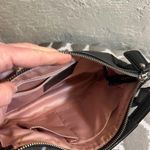 Coach Black Crossbody Bag with Adjustable Strap and Flap Closure Photo 12