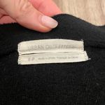 Urban Outfitters • cropped black sweater • Photo 1