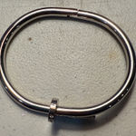 Silver Bent Bracelet with Bejeweled Nail Edges Photo 0