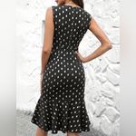 ⚠️ Clearance New Black dress with gold dots and ruffle hem
Size small Photo 1