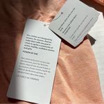 Athleta NWT  Sunrise V neck Sweatshirt Medium peachy orange color thumb holes Photo 10