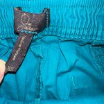 Jaanuu Turquoise Scrub Set Photo 16