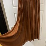 Prómesa Promesa | Elegant Brown Pleated Skirt Photo 1