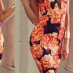 Shareen  Collection V Neck Black and Orange Floral Print Dress Photo 1