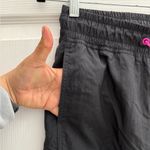 Nike Sportswear Icon Clash Womens Pants Black Fire Pink size small Photo 6