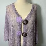 Vintage Purple knit cardigan with button detailing
Size 2x
Brand Kaktus Photo 1