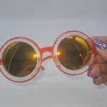 Zumiez Petals and Peacocks Extasy Orange Round Reflective Sunglasses Photo 1