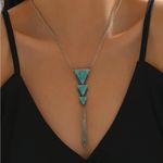 Cute silver downwards pyramid necklace with turquoise stone design. New Photo 0