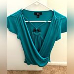 BCX  women’s top. Teal size medium cross front style. Short sleeves Photo 1