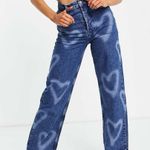 Topshop Oversized Mom Jeans with Bleached Hearts in Mid-Blue | 24P Photo 0
