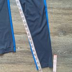 Saucony  Dark Blue Leggings with Blue Stripe S Photo 6