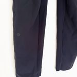 Lululemon  On the Fly 7/8 Pant Woven Black Size 4 LW5BPMS Photo 6