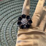 Simply stunning navy blue with gold colored trim and crystals flower ring EUC Size 6 Photo 2