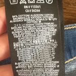 7 For All Mankind | Women's Mid Roll Distressed Blue Cuffed Denim Shorts, 25 Photo 6