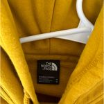 The North Face  Yellow Hoodie Sweatshirt Photo 1