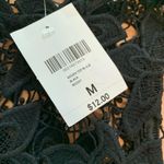 3/$22🌞 NWT Ambiance black Floral Crochet With Fringe Top Size M Photo 1