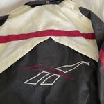 Reebok windbreaker jacket with mesh venting across back Photo 2