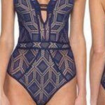 Becca NWOT  Wanderlust Color Play One Piece Swimsuit Navy blue mesh bodysuit bikini swimwear with cut out back and tie up detail Photo 0