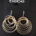 Bebe  multi Gold rings & Crystal stud earrings Photo 0
