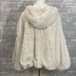Free People Movement Take a Moment Faux Fur Hooded Jacket in ivory. Photo 6