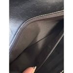 DKNY Genuine Black Leather Silver Tone Oval Metal Accent Sleek Clutch Bag Photo 6