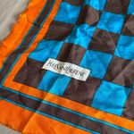 Yves Saint Laurent Silk Raw Hem 26” x 26”
Color Orange Blue Brown Photo 2