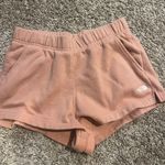 The North Face Pink sweat shorts Photo 0