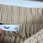 Aritzia Tna women’s speed tan high waisted joggers performance athletic size L Photo 1