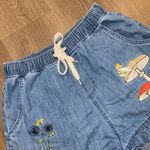 Disney  Peter Pan Tinker Bell Denim Ruffle Tinker Bell Embroidery Shorts Sz Large Photo 0