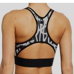 Ultracor  Women's Black Graffito‎ Terrain Cut Out Sports Bra Size Small Photo 1