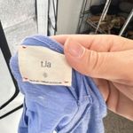 Anthropologie T.La Women’s blue SS TIE BACK Cut out MYA Tunic Top Small Photo 8