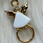 Angel mother of pearl gold tone pin Photo 0