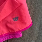 New Balance  Women's Pink and Purple Shorts Photo 1