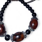 Brown and black beaded bracelet #
bohostyle #jewelry #Bracelet #cute Photo 0