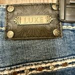 Luxe  Denim Jeans with Rhinestone accents and white stitching Photo 9