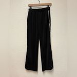 Oysho  Softstreme Feel Black Wide-Leg Pants with tuxedo woven striped down side Photo 4