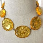 yellow and gold tone cut out statement necklace Photo 0