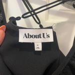 About Us Black Bodysuit Photo 2