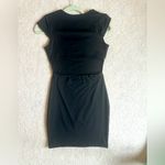 Little black dress with back cutout. Photo 1