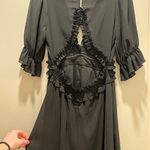 Black ruffle romper Photo 1