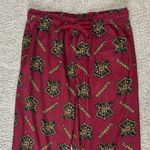 Harry Potter  Hogwarts Lounge Pants, maroon, size small Photo 0