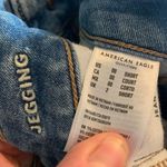 American Eagle  medium wash 00 short distressed jeggings Photo 2
