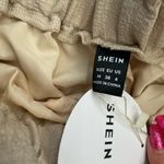 Tan ruffled shorts size medium Photo 2